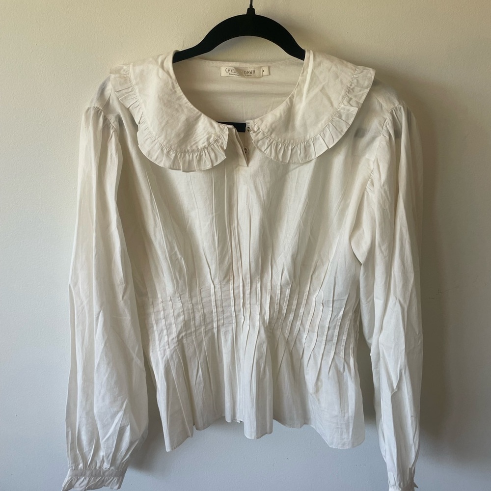 Cream Christy dawn blouse with black side zipper